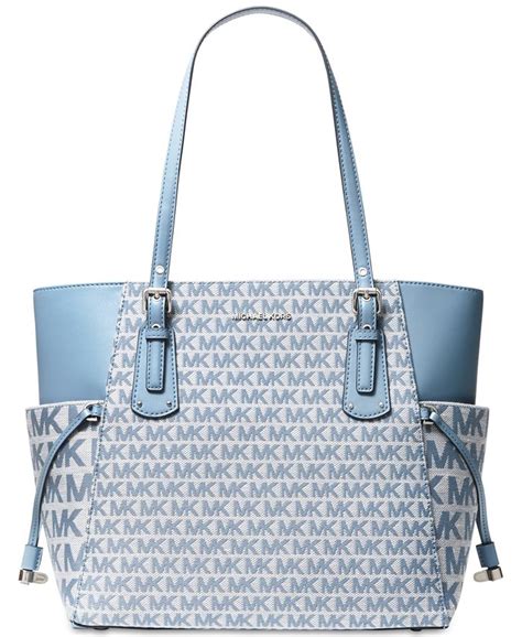 michael michael kors signature voyager east west tote|signature sinclair east west tote.